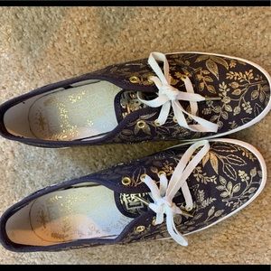 Keds brown and gold flower sneakers